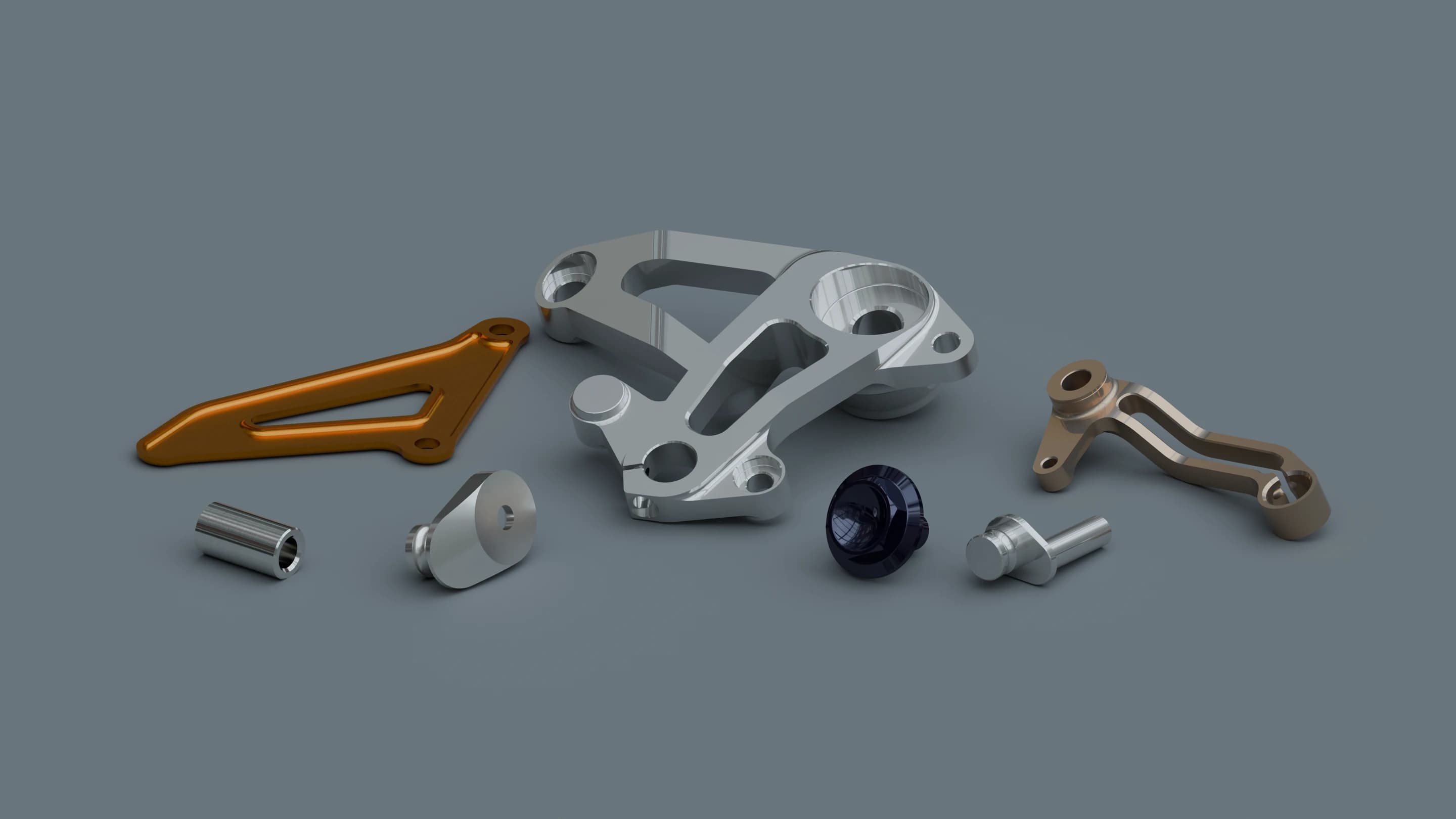 A collection of mechanical parts with recognizable surfaces, holes and structural features